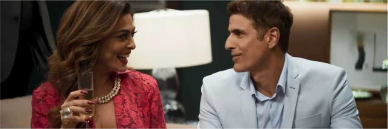 Maria da Paz (Juliana Paes) vai ao jantar oferecido pela Beatriz (Natália do Vale) com o Régis (Reynaldo Gianecchini) — Foto: TV Globo