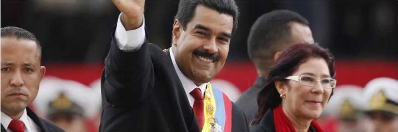 Nicolás Maduro, no dia de sua primeira posse como presidente da Venezuela, em 19 de abril de 2013, ao lado de Cilia Flores 